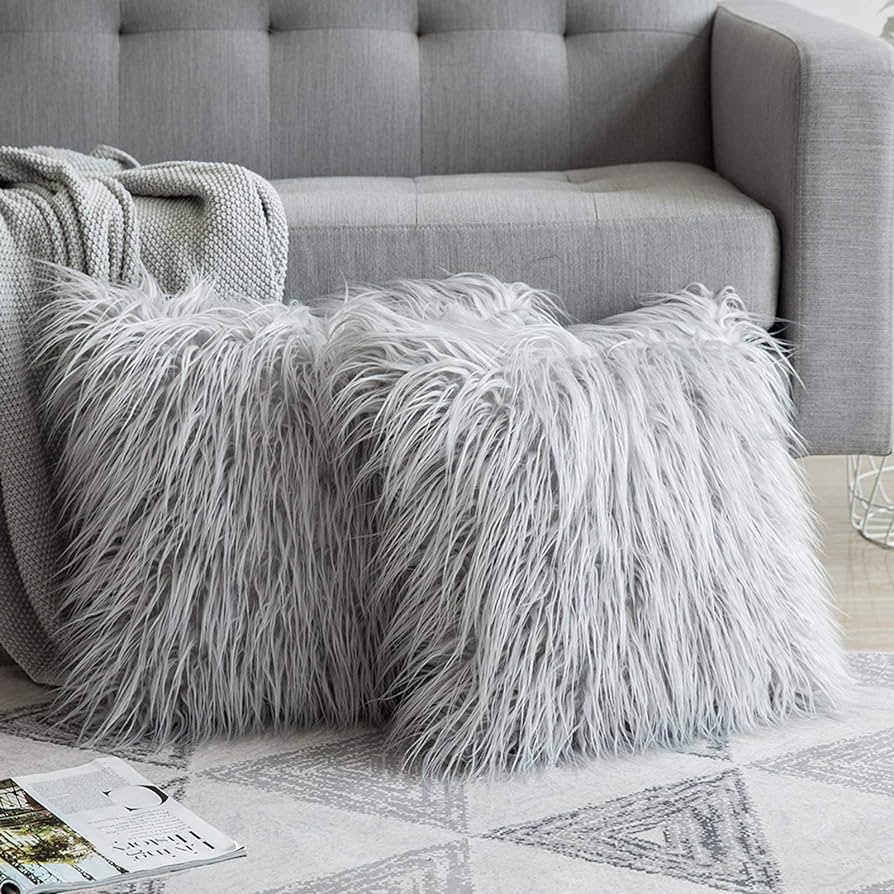 ¿Cómo combinar los cojines del sofá para lucir bien?插图